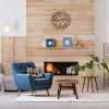 Modern living room with blue chair, wooden accents, coffee table, stylish decor, and soft lighting for a cosy ambience